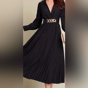 Black pleated midi dress.